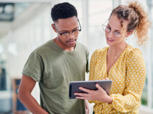 two small business owners consider the importance of competitive keyword research