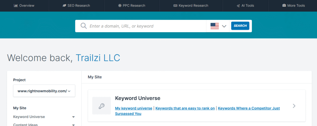 A dashboard displays keyword research tools, keyword difficulty, a search bar, and a welcome message for Trailzi LLC.