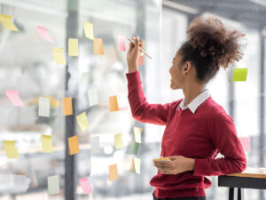 An female employee discussing marketing strategy vs business strategy