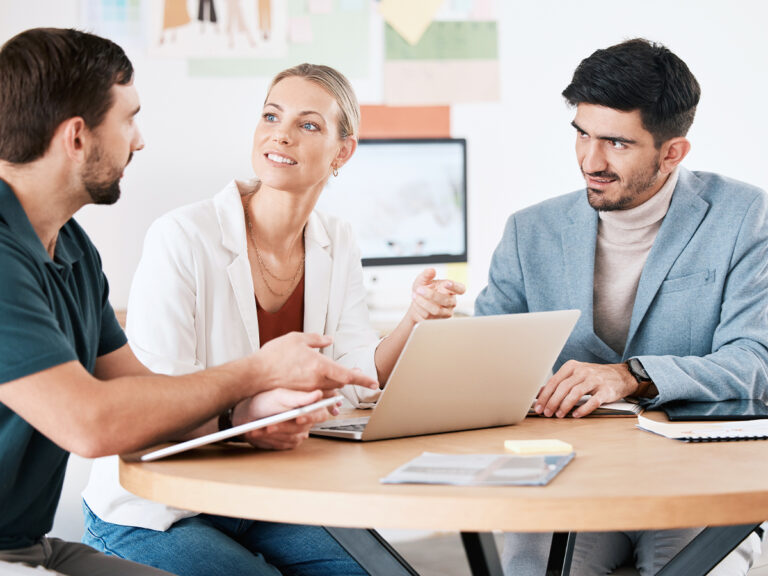 Small business team researching how to generate more leads for consulting business