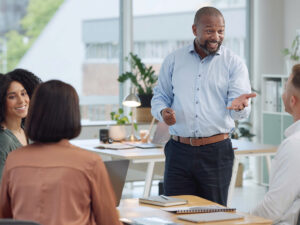 Discussing content marketing strategy examples in a small business team meeting