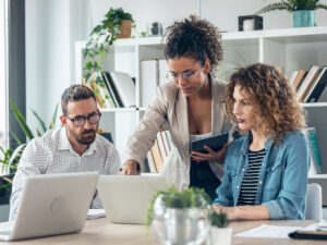 Small business team researching on marketing automation tools for small business