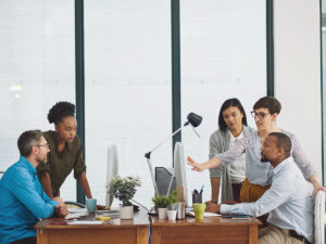 A business team learning how to optimize google business page to improve their SEO