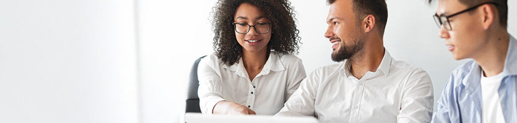 Three small business owners research what is the difference between high intent and low intent search phrases.