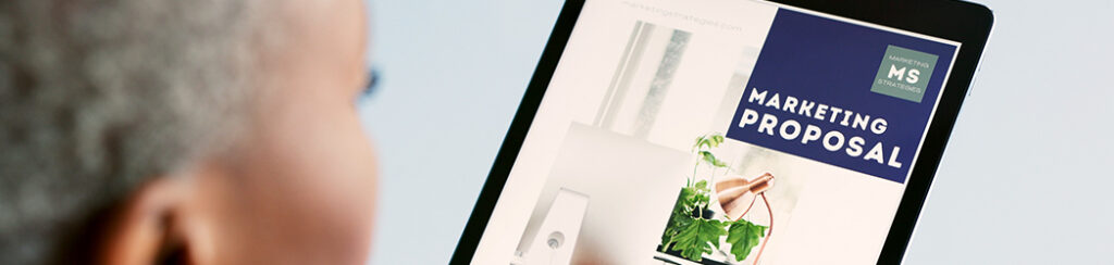 She views a tablet displaying a local business marketing proposal.