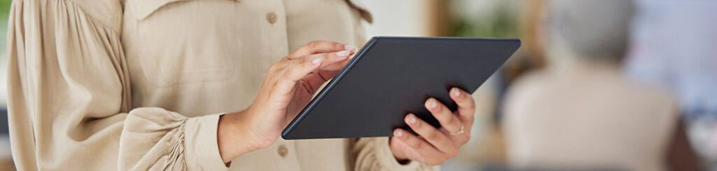 She is learning about choosing a niche for your online business via tablet