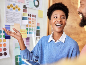 Small business in-house designer discusses how to create a brand identity with a colleague