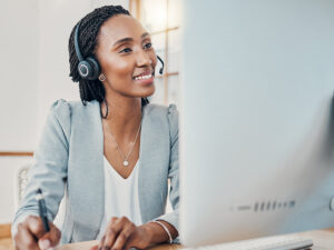 Woman doing seo copy work at her desk.