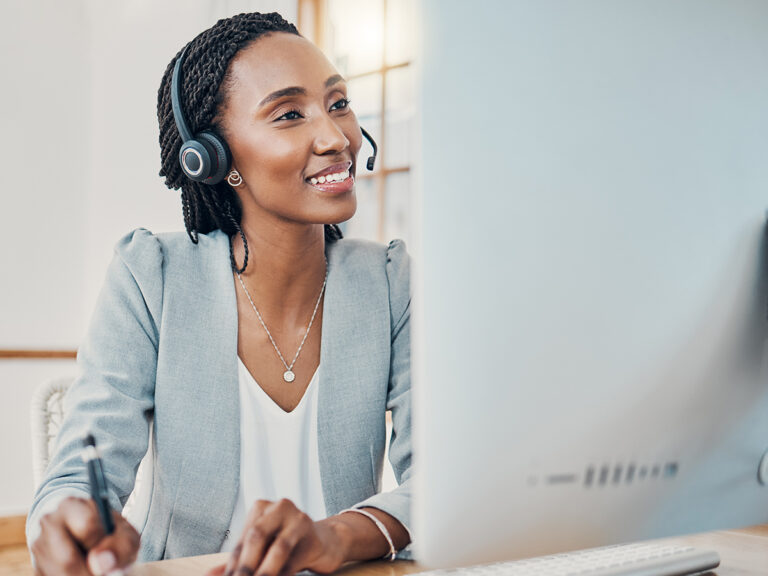 Woman doing seo copy work at her desk.